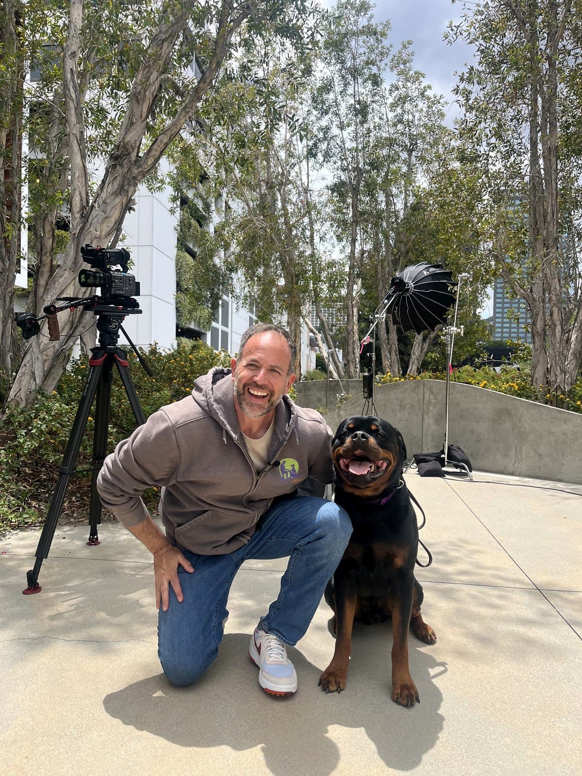 Brett Endes with a calm, attentive Rottweiler during an Austin training session